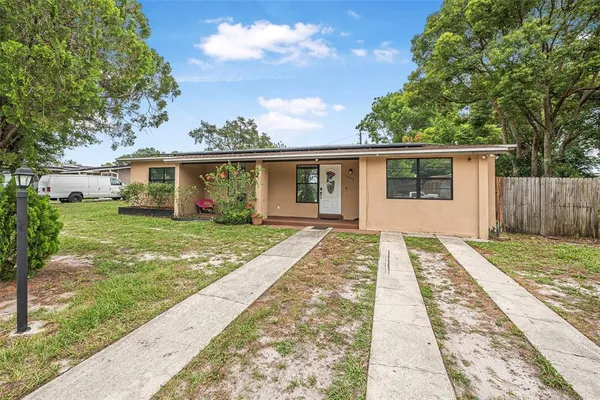 front view of a house with a yard
