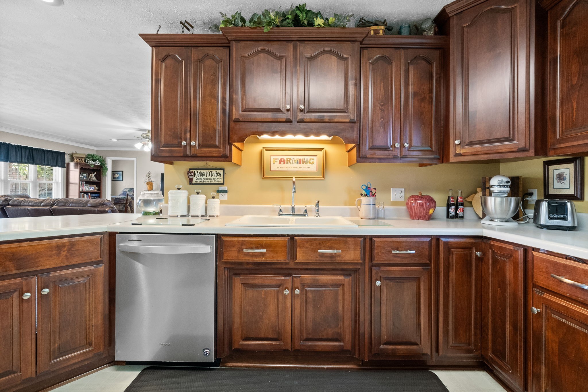 286 Tower Street Guthrie, KY 42234 - Photo 13 of 48 a kitchen with granite countertop wood cabinets and stainless steel appliances