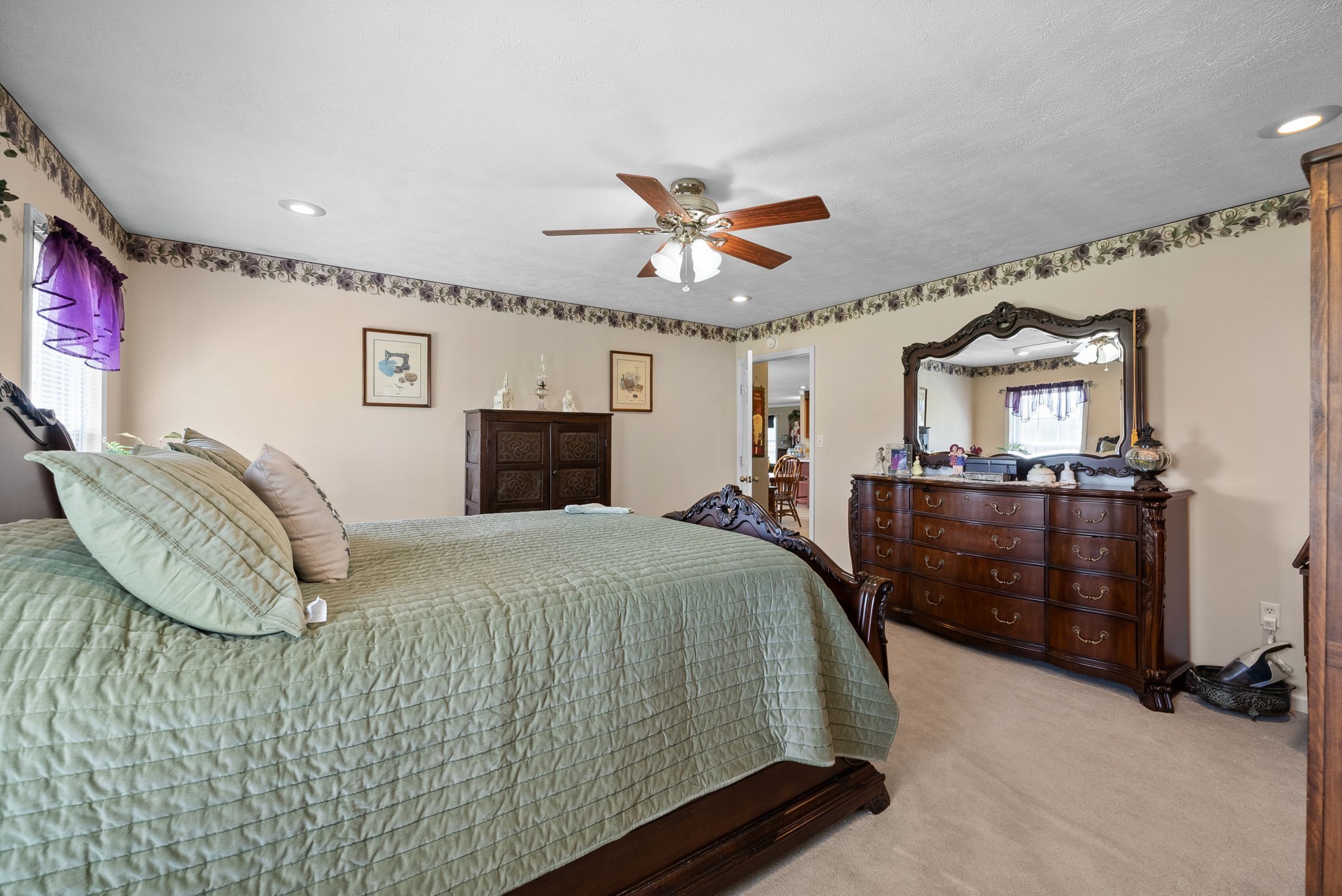 286 Tower Street Guthrie, KY 42234 - Photo 18 of 48 a bed room with a bed and a chandelier