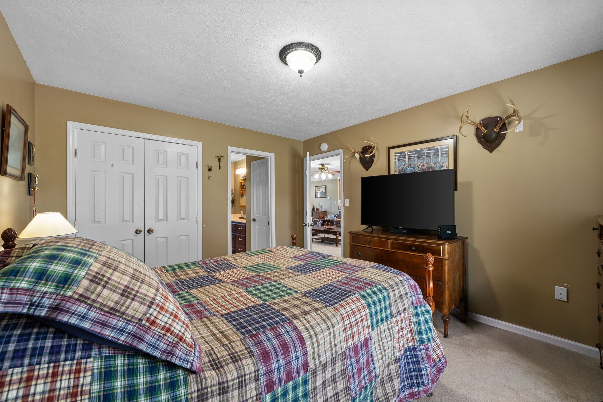 286 Tower Street Guthrie, KY 42234 - Photo 24 of 48 a bedroom with a bed and a flat screen tv