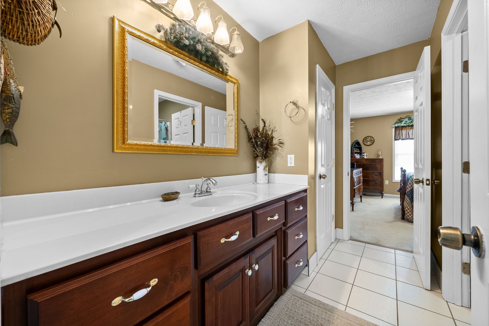286 Tower Street Guthrie, KY 42234 - Photo 28 of 48 a spacious bathroom with a granite countertop sink a mirror and a shower