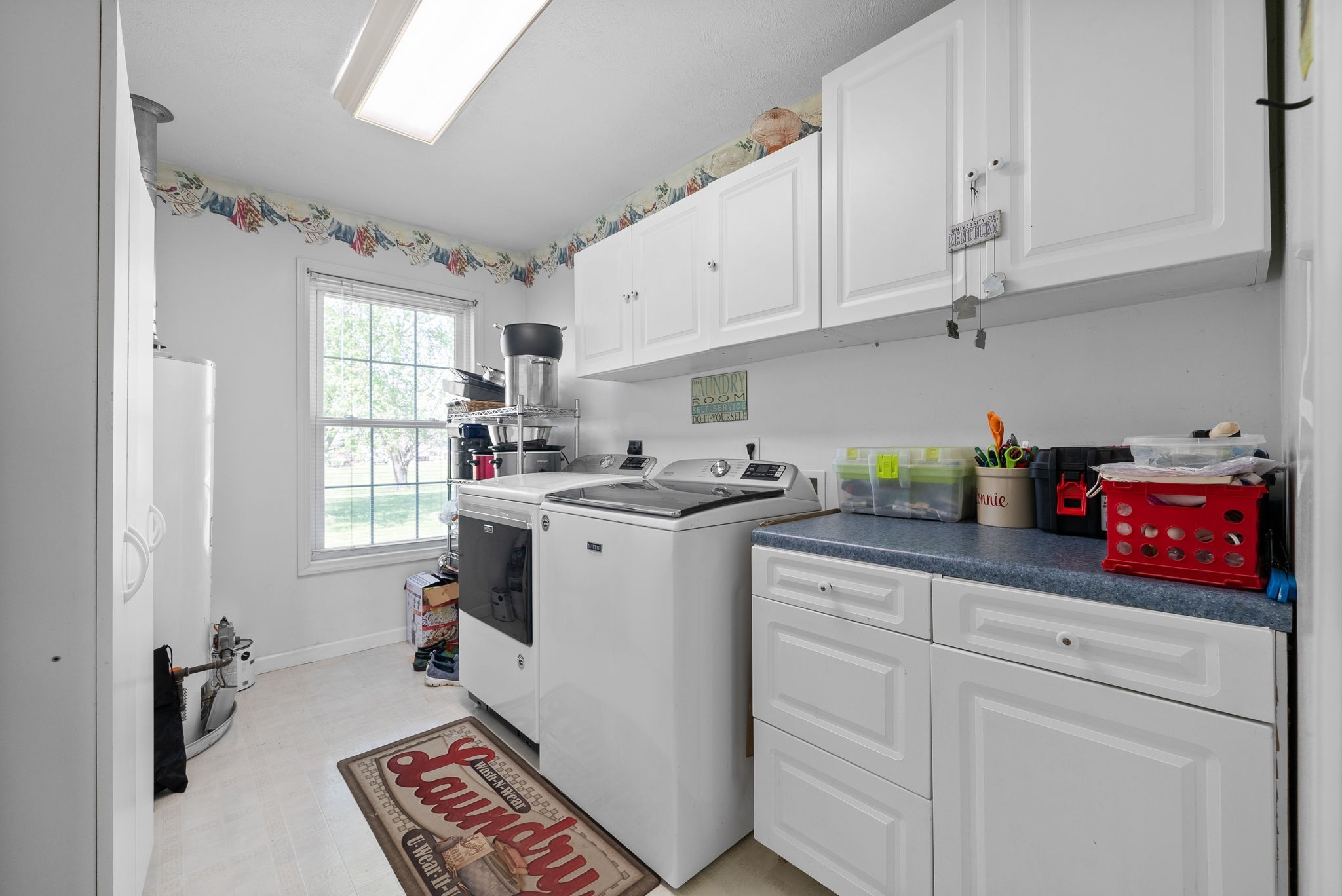 286 Tower Street Guthrie, KY 42234 - Photo 29 of 48 a kitchen with cabinets appliances a sink and a window