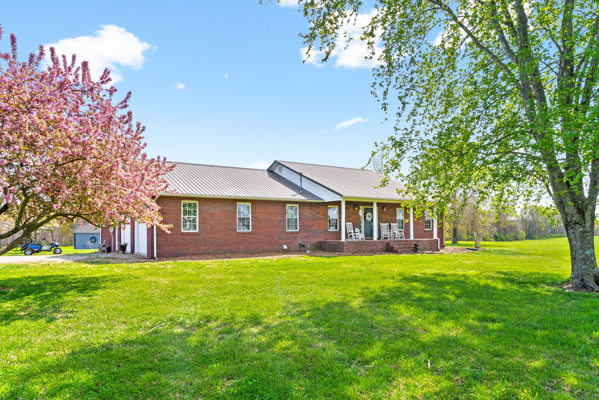286 Tower Street Guthrie, KY 42234 - Photo 47 of 48 a house view with a sitting space and garden