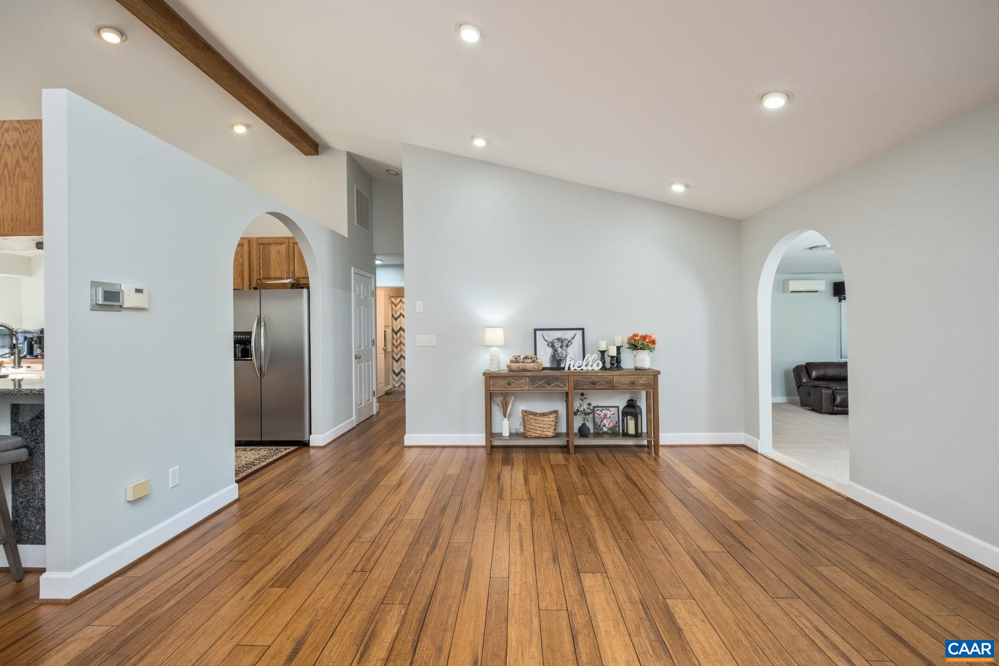 105 Squirrel Path Stanardsville, VA 22973 - Photo 20 of 67 a living room with furniture and a wooden floor