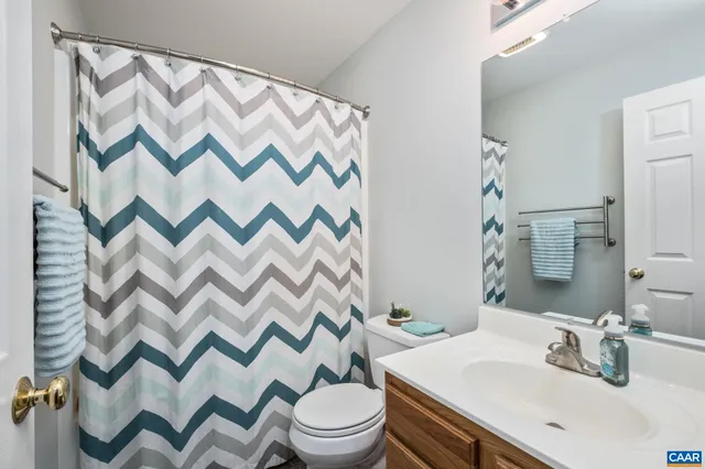 a kitchen with a stove and cabinets