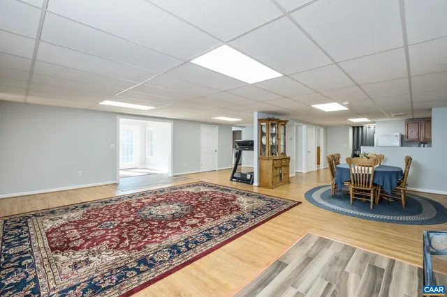 a room with gym equipment and a mirror