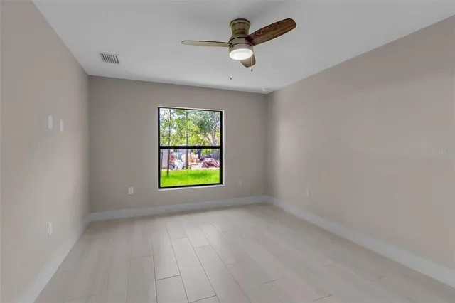 an empty room with window