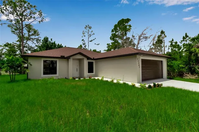 a aerial view of a house with a garden