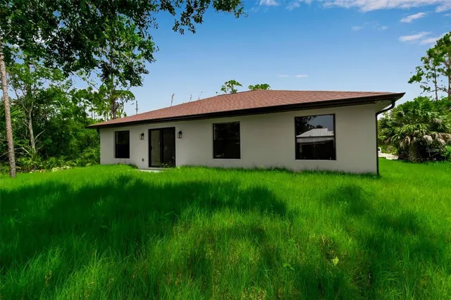 a house view with a garden space