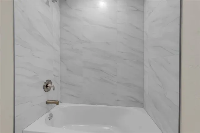 a bathroom with a bathtub