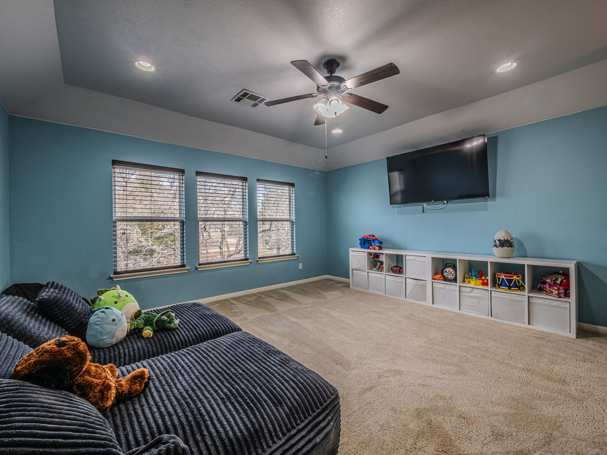 117 Arbor Point Drive Elgin, TX 78621 - Photo 20 of 40 Bedroom with carpet floors, ceiling fan, and recessed lighting
