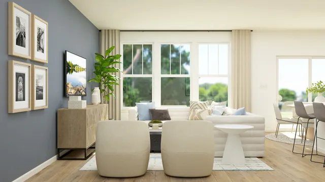 a dining room with furniture and large windows