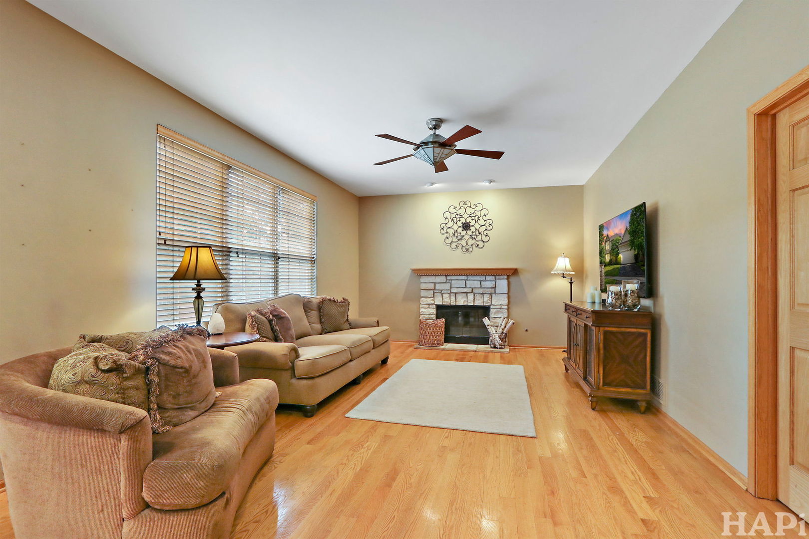 261 Hampton Road Sugar Grove, IL 60554 - Photo 11 of 35 a living room with furniture and a fireplace