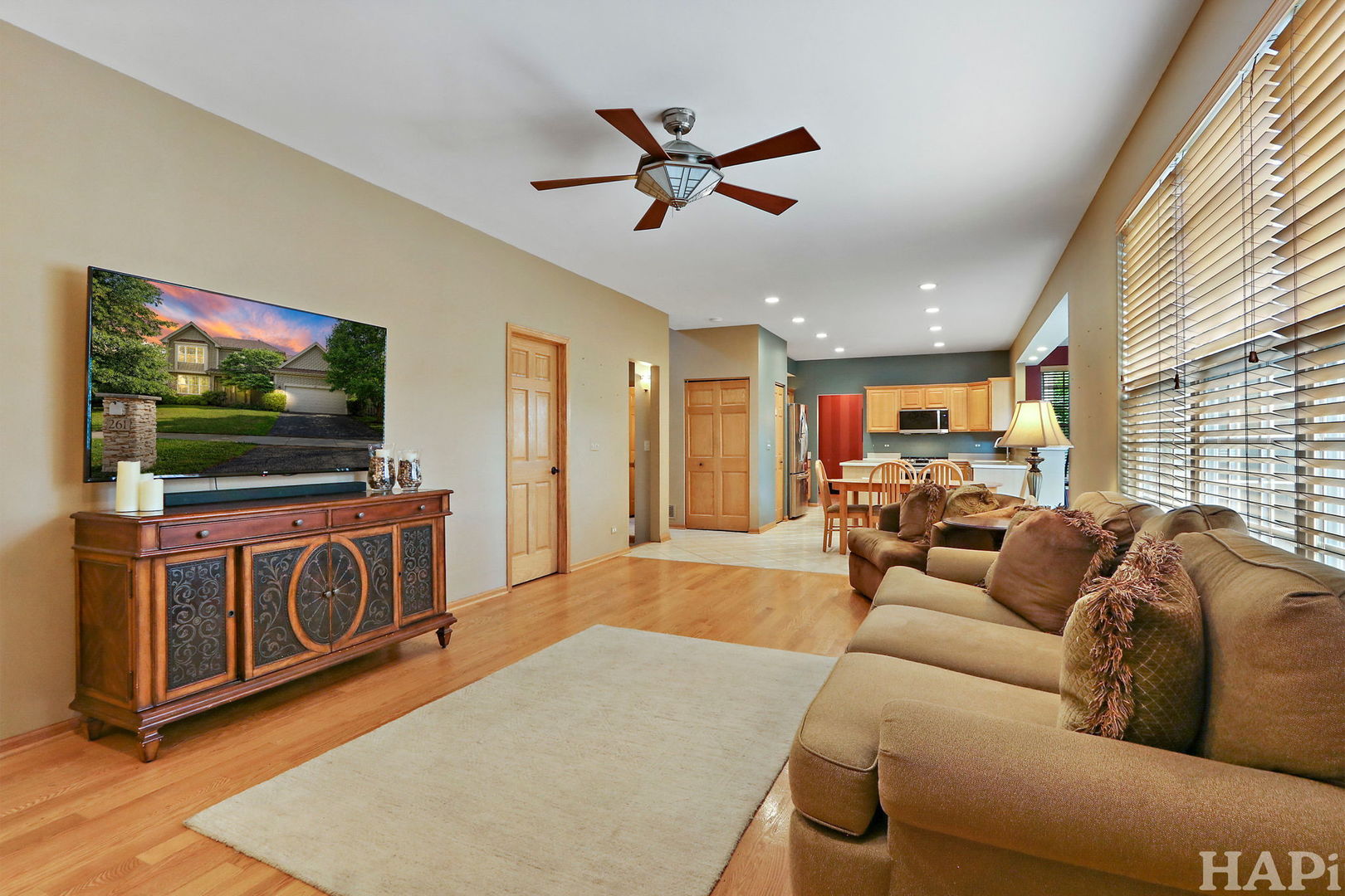 261 Hampton Road Sugar Grove, IL 60554 - Photo 12 of 35 a living room with furniture and a flat screen tv