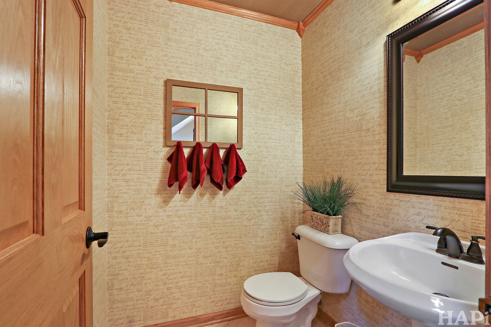 261 Hampton Road Sugar Grove, IL 60554 - Photo 13 of 35 a bathroom with a toilet sink and mirror