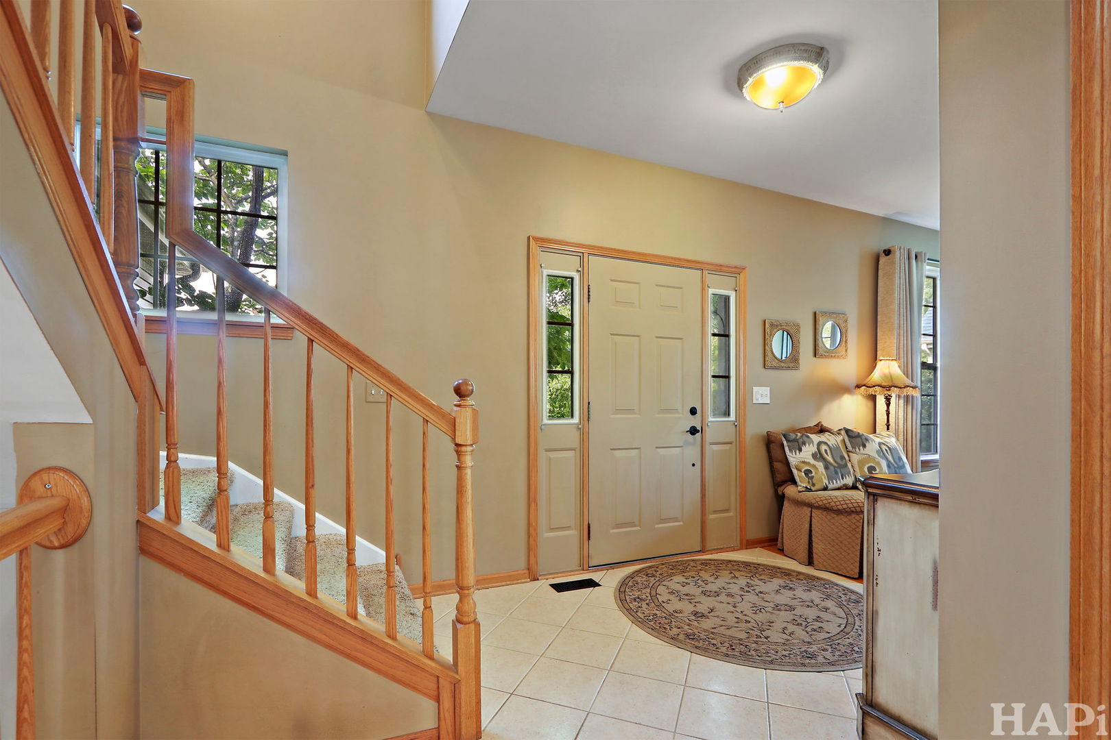 261 Hampton Road Sugar Grove, IL 60554 - Photo 15 of 35 a view of a hallway with wooden floor and stairs