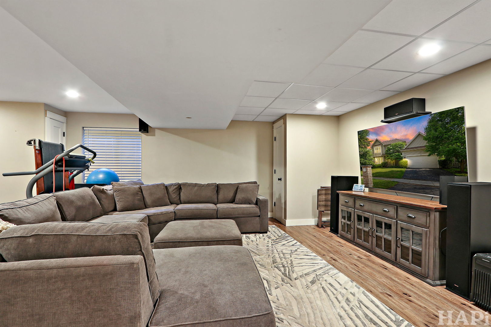 261 Hampton Road Sugar Grove, IL 60554 - Photo 25 of 35 a living room with furniture and a flat screen tv