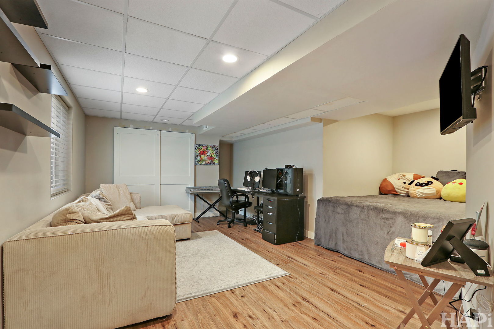 261 Hampton Road Sugar Grove, IL 60554 - Photo 26 of 35 a living room with furniture and a flat screen tv