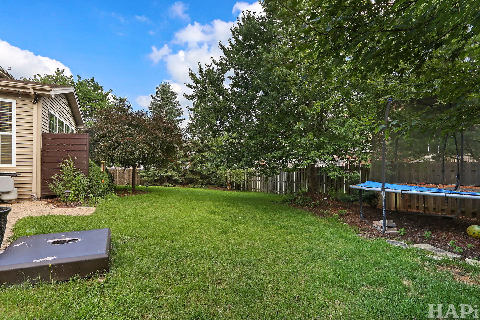 261 Hampton Road Sugar Grove, IL 60554 - Photo 29 of 35 a view of a backyard with sitting area