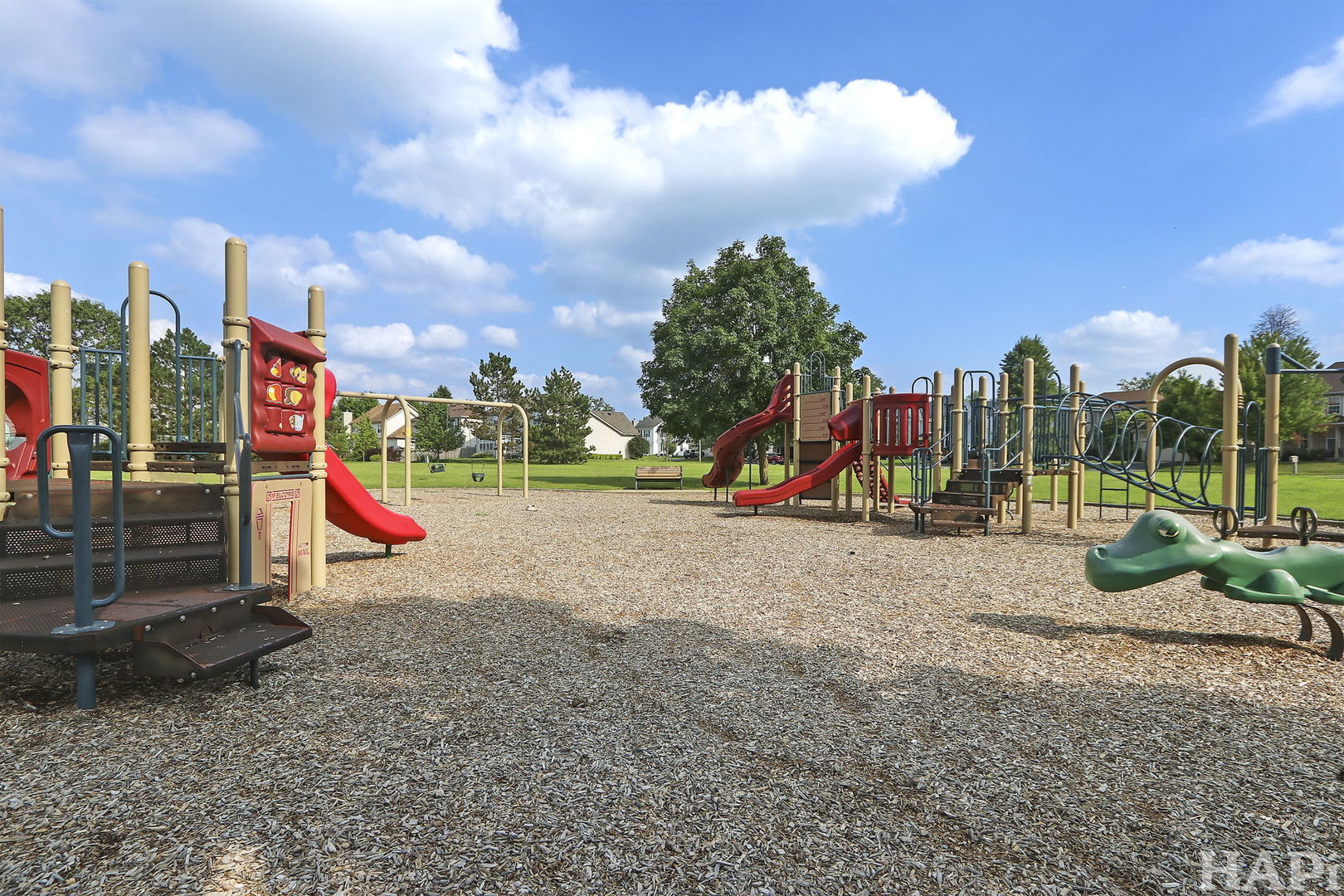 261 Hampton Road Sugar Grove, IL 60554 - Photo 31 of 35 a view of a park with swings and slides