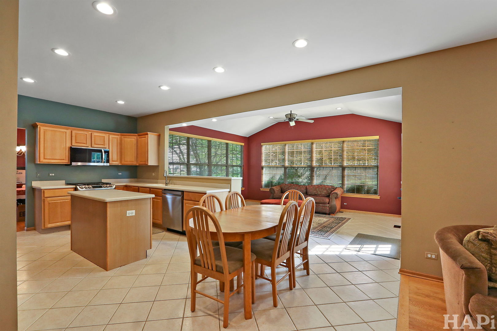 261 Hampton Road Sugar Grove, IL 60554 - Photo 6 of 35 a large kitchen with a table and chairs
