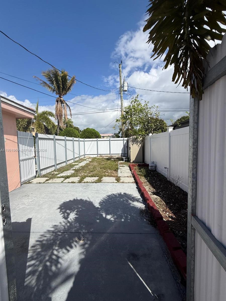 625 East 8th Lane Hialeah, FL 33010 - Photo 26 of 46 a view of a backyard of the house