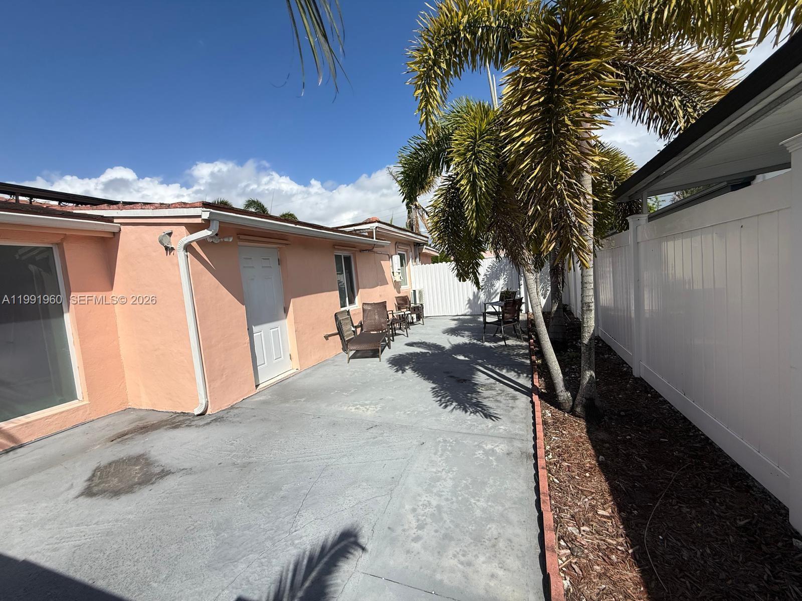 625 East 8th Lane Hialeah, FL 33010 - Photo 27 of 46 a view of outdoor space and yard