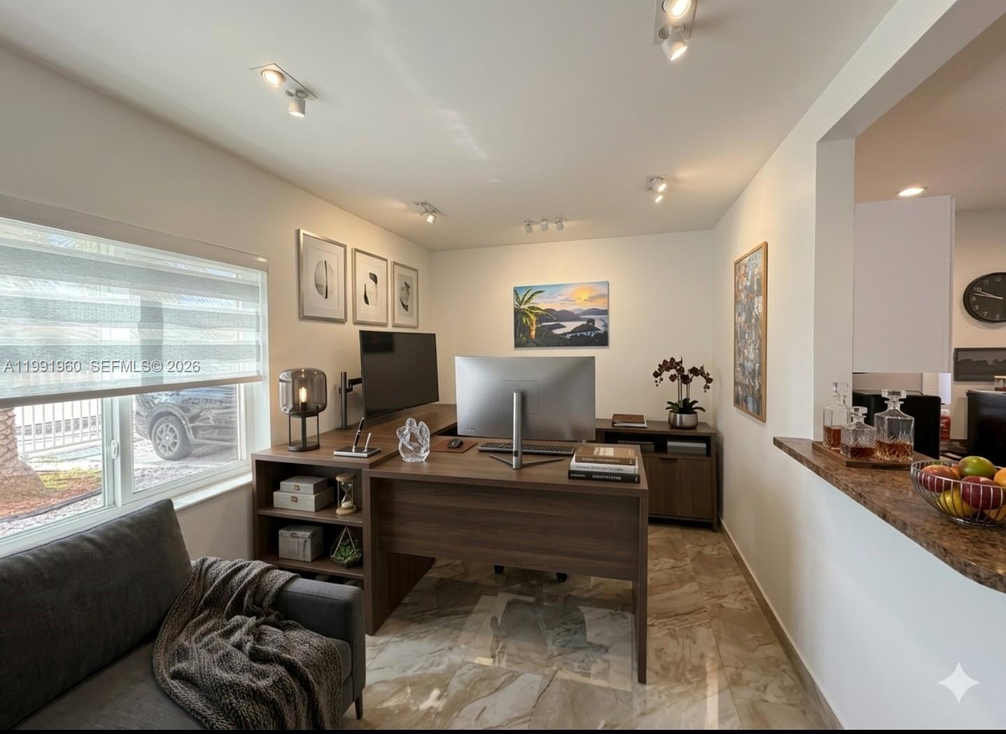 625 East 8th Lane Hialeah, FL 33010 - Photo 3 of 46 a living room with furniture a large window and a dining table
