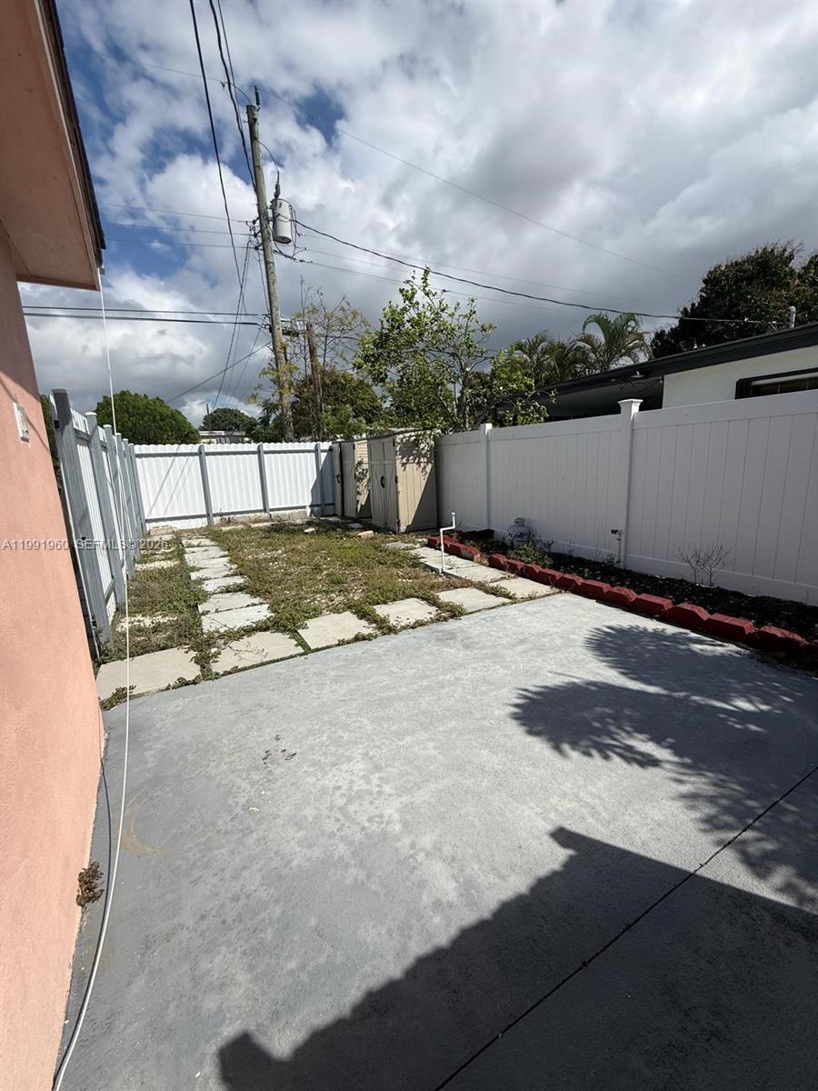 625 East 8th Lane Hialeah, FL 33010 - Photo 35 of 46 a view of a backyard of the house
