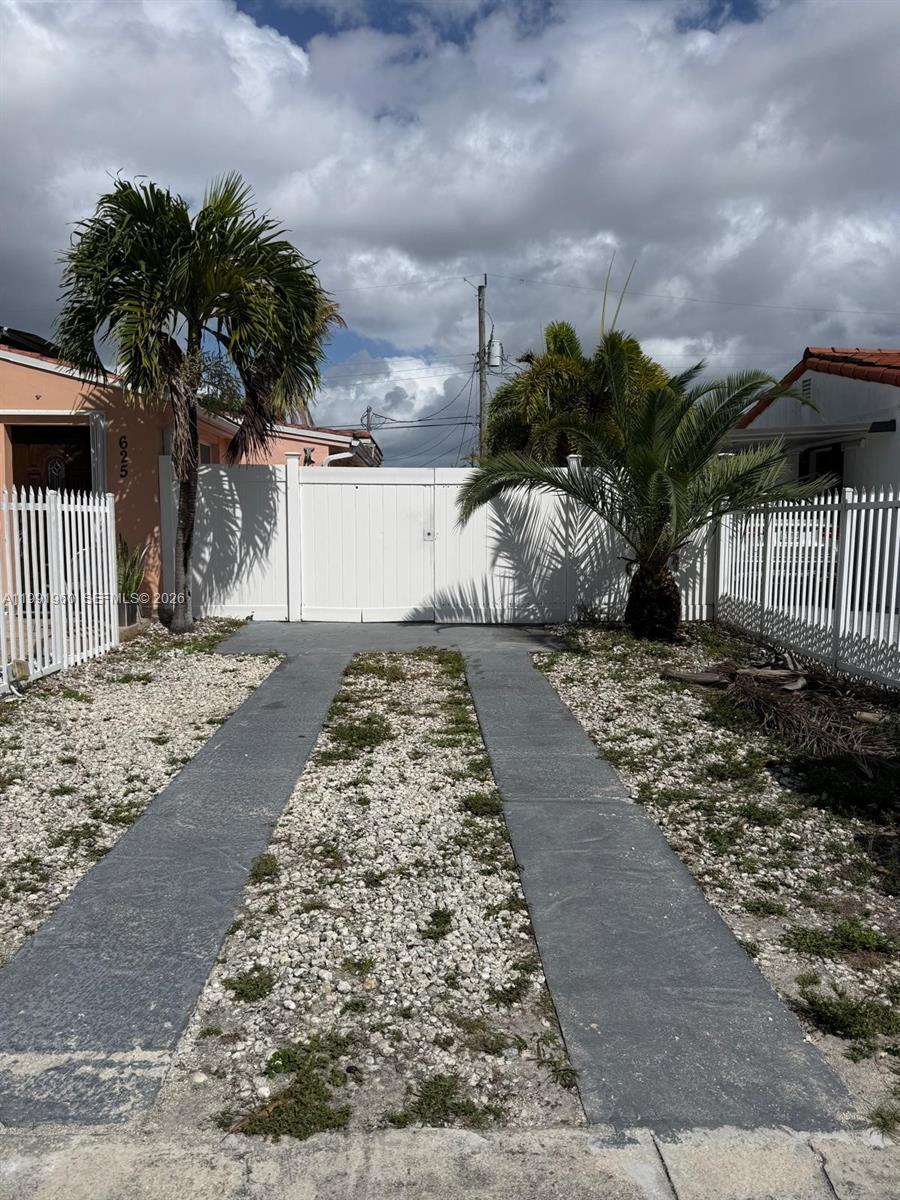 625 East 8th Lane Hialeah, FL 33010 - Photo 36 of 46 a view of a backyard of the house