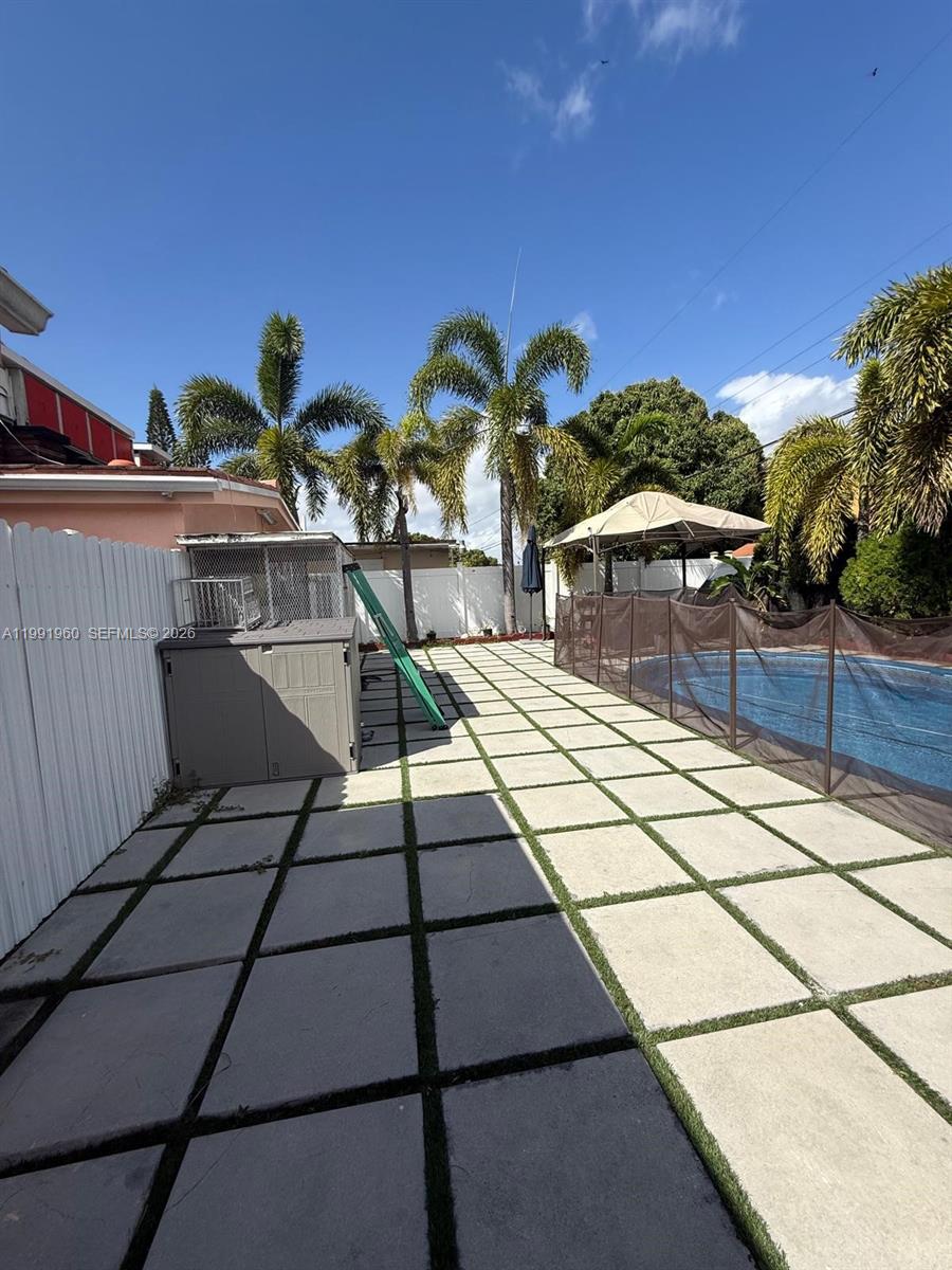 625 East 8th Lane Hialeah, FL 33010 - Photo 38 of 46 a view of a terrace with chairs