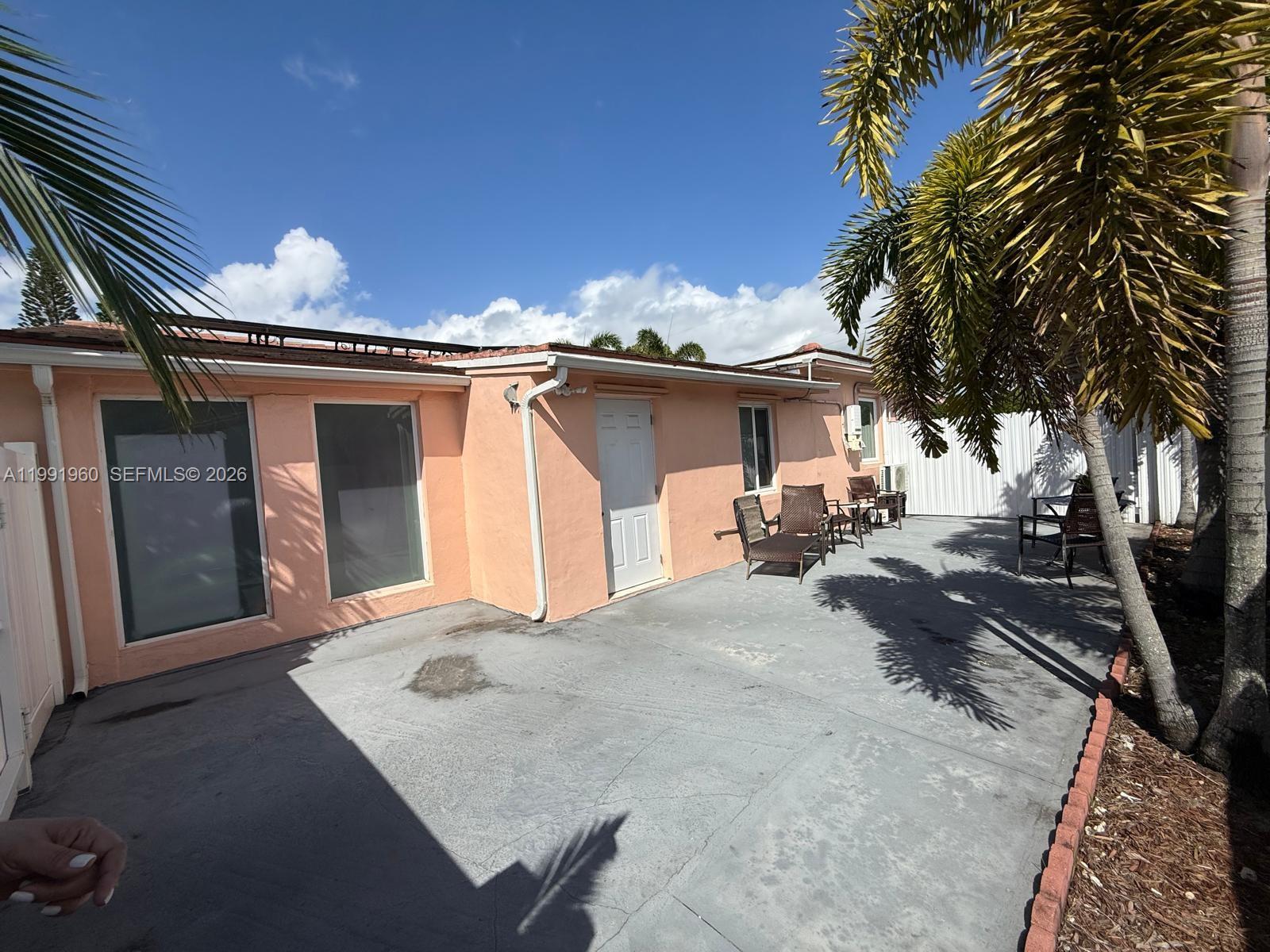 625 East 8th Lane Hialeah, FL 33010 - Photo 45 of 46 a view of a house with a patio