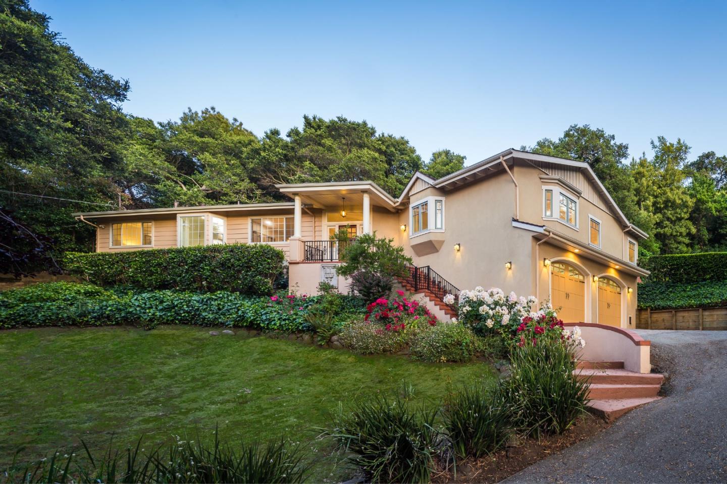 2260 Summit Drive Hillsborough, CA 94010 - Photo 1 of 1 a front view of a house with a garden