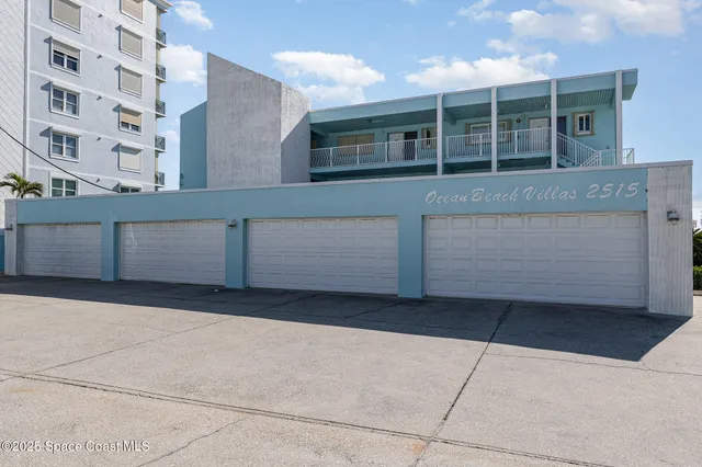 a view of a balcony with a chairs