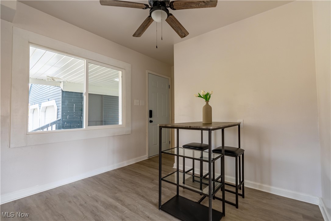 1931 Bridger Road Akron, OH 44312 - Photo 15 of 40 Dining room featuring ceiling fan and hardwood / wood-style floors