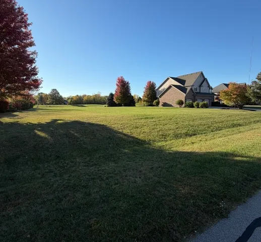 a view of a lake and outdoor space