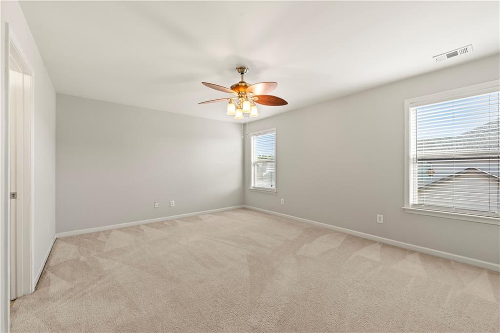 3181 Day Break Lane Dacula, GA 30019 - Photo 19 of 25 an empty room and window