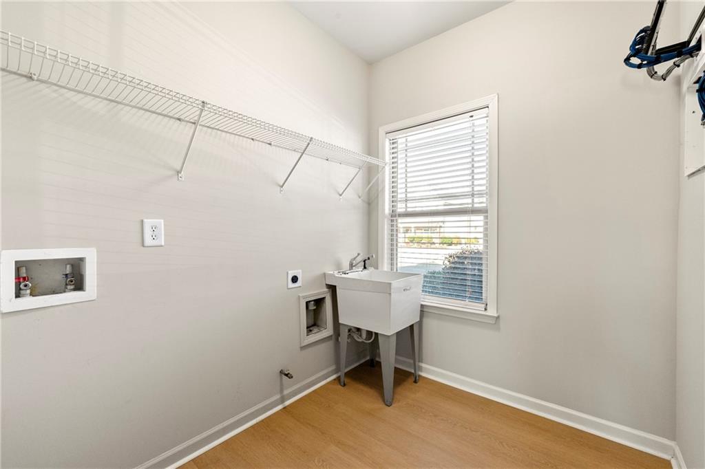 3181 Day Break Lane Dacula, GA 30019 - Photo 22 of 25 a room that has a window and a table in it