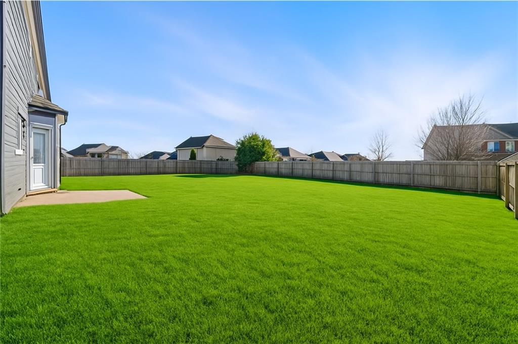3181 Day Break Lane Dacula, GA 30019 - Photo 24 of 25 a view of yard with swimming pool and green space