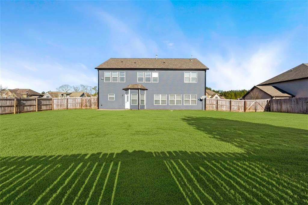 3181 Day Break Lane Dacula, GA 30019 - Photo 25 of 25 a view of a house with a yard