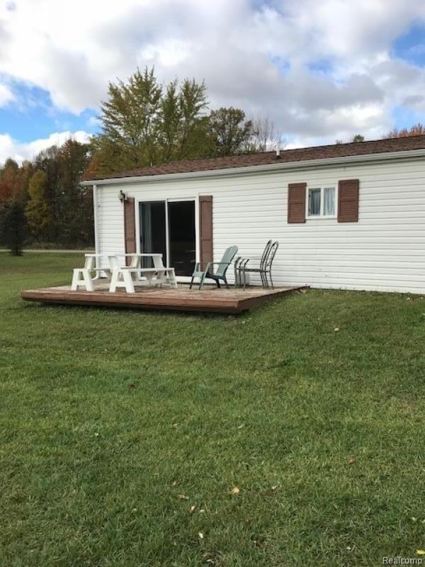 3961 Washburn Road Vassar, MI 48768 - Photo 24 of 25 The cement patio is off the family room.
