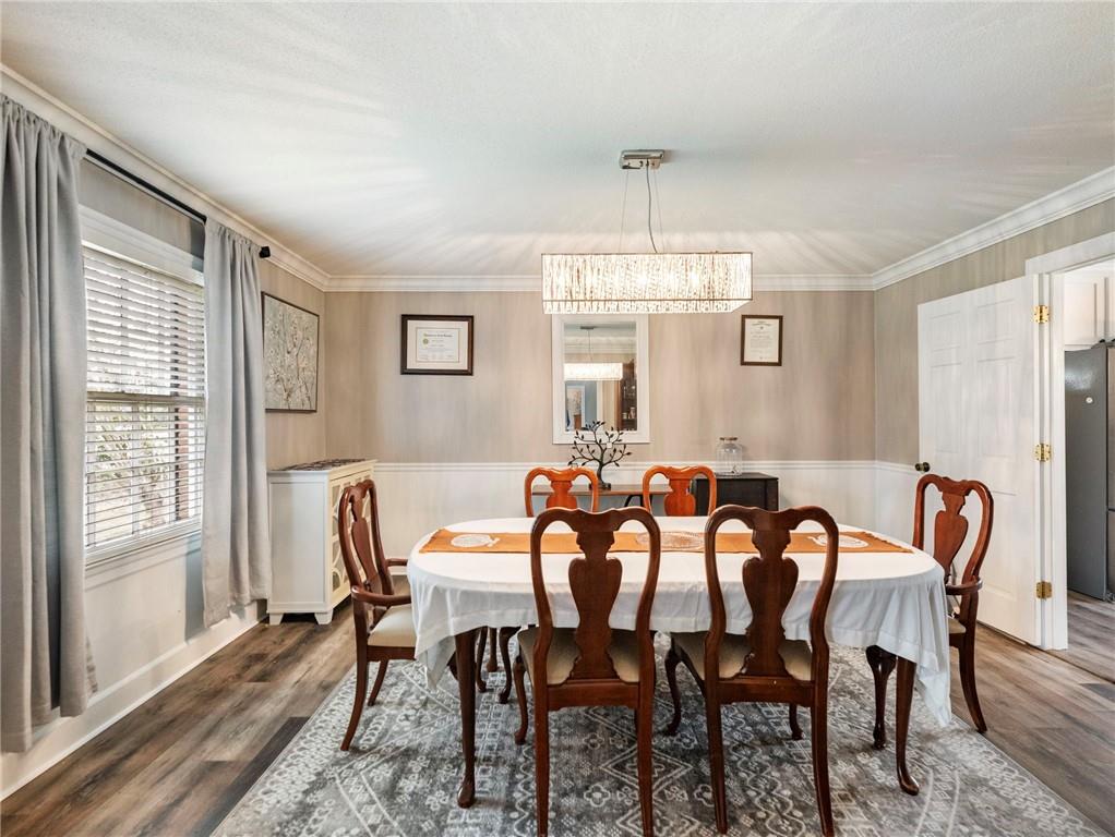 945 Poplar Street Monroe, GA 30655 - Photo 14 of 55 a view of a dining room with furniture window and outside view