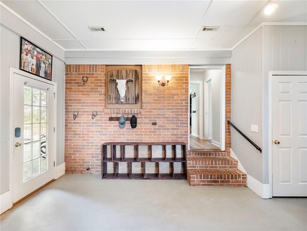 945 Poplar Street Monroe, GA 30655 - Photo 27 of 55 a large white room with windows