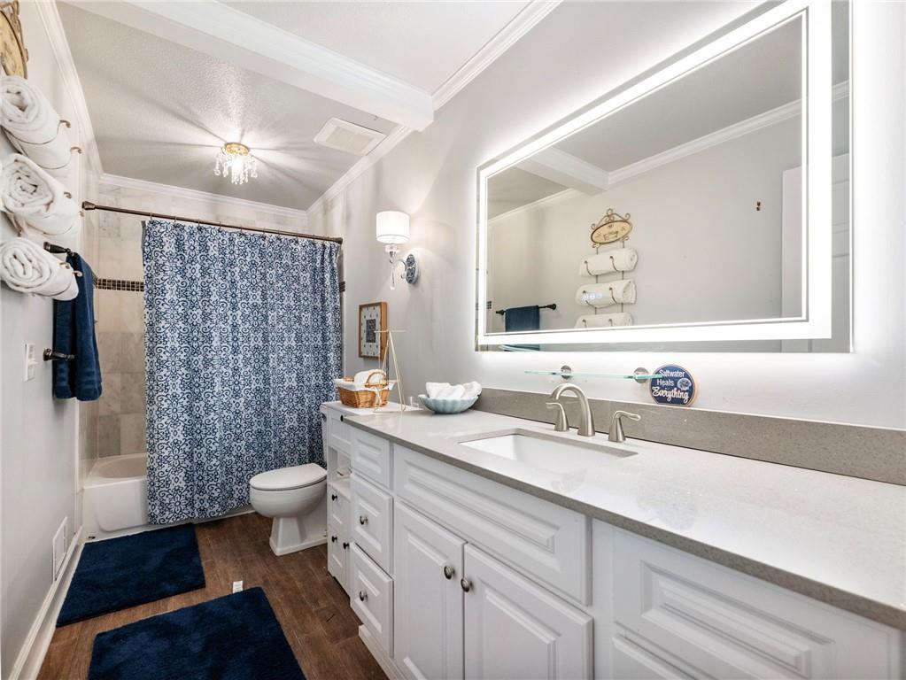 945 Poplar Street Monroe, GA 30655 - Photo 36 of 55 a bathroom with a sink and a mirror