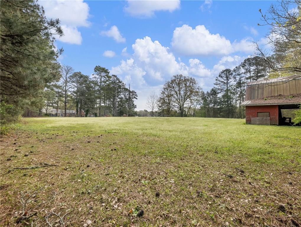 945 Poplar Street Monroe, GA 30655 - Photo 52 of 55 a view of a field with an ocean
