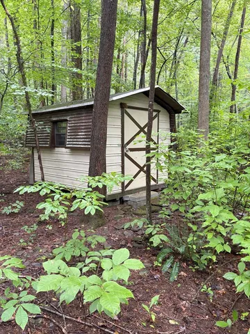 a garden view with a seating space