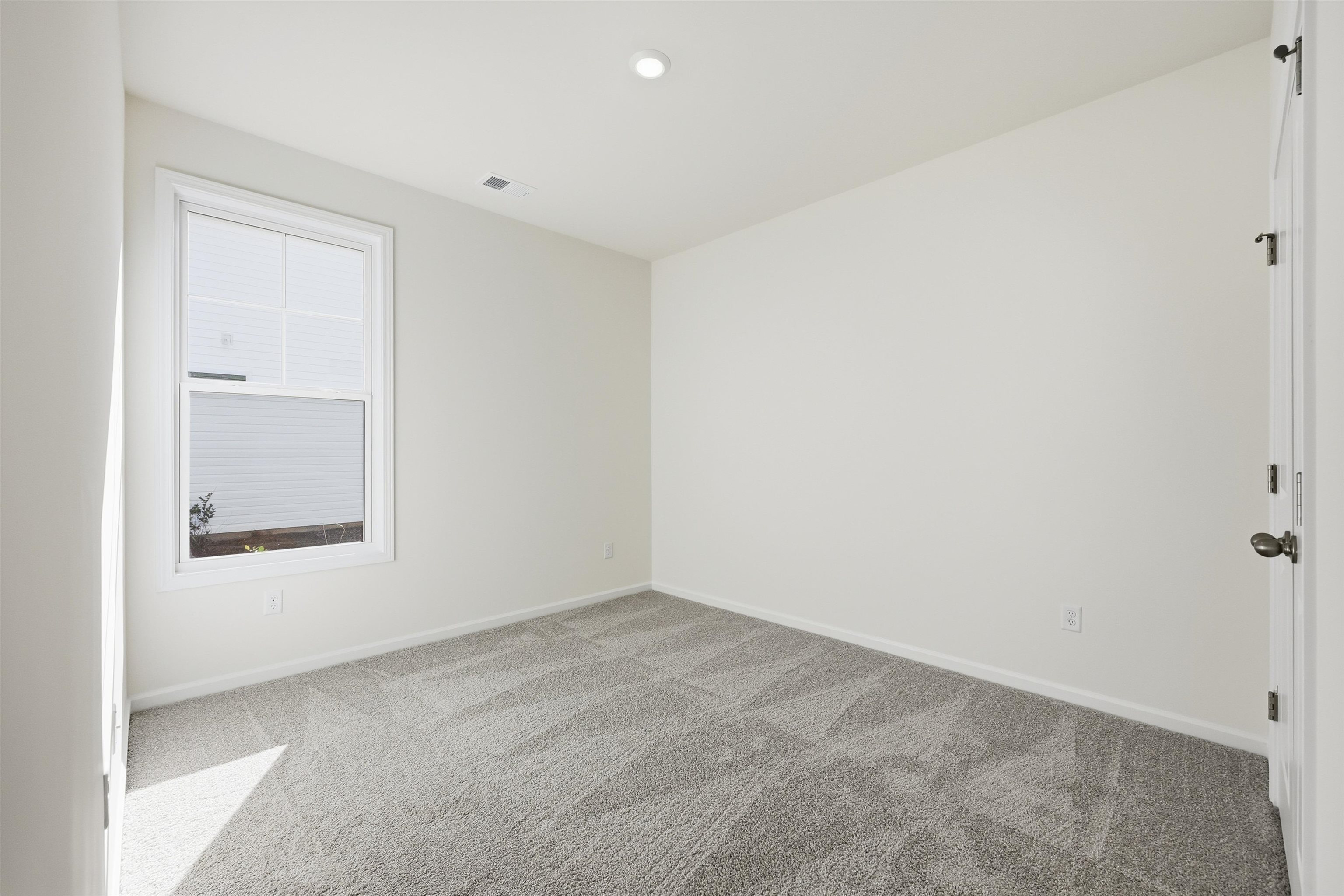 141 River Birch Drive Loris, SC 29569 - Photo 14 of 37 Unfurnished room featuring carpet flooring and baseboards