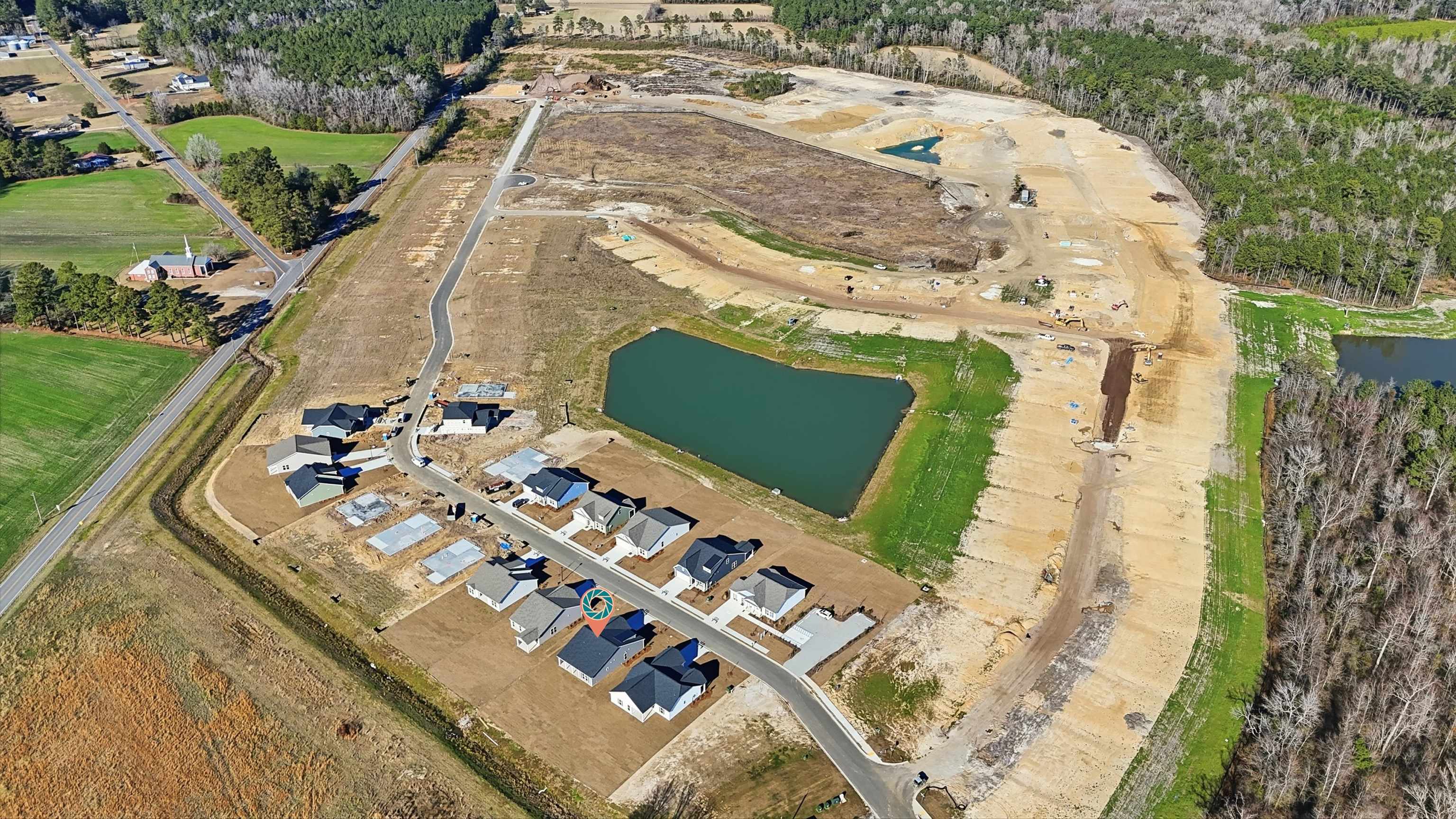 141 River Birch Drive Loris, SC 29569 - Photo 19 of 37 Aerial view of property and surrounding area with a large body of water