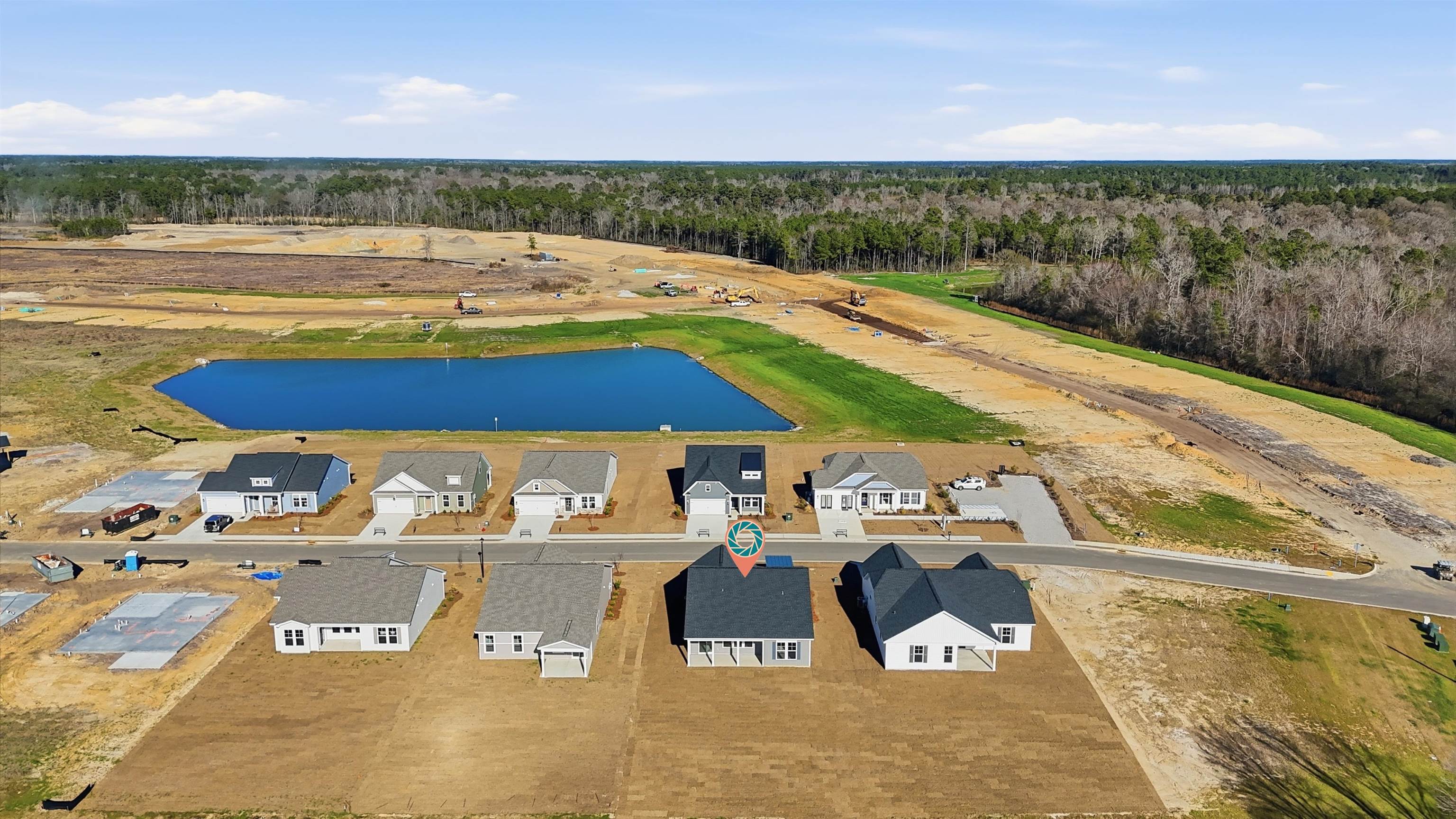 141 River Birch Drive Loris, SC 29569 - Photo 20 of 37 Bird's eye view of a nearby body of water and a heavily wooded area