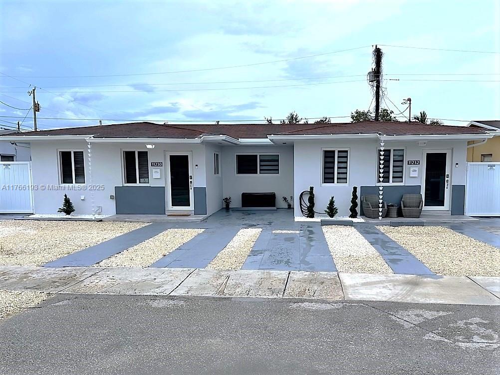 11232 Southwest 5th Street, Unit 2 Sweetwater, FL 33174 - Photo 24 of 24 a view of a house with a patio